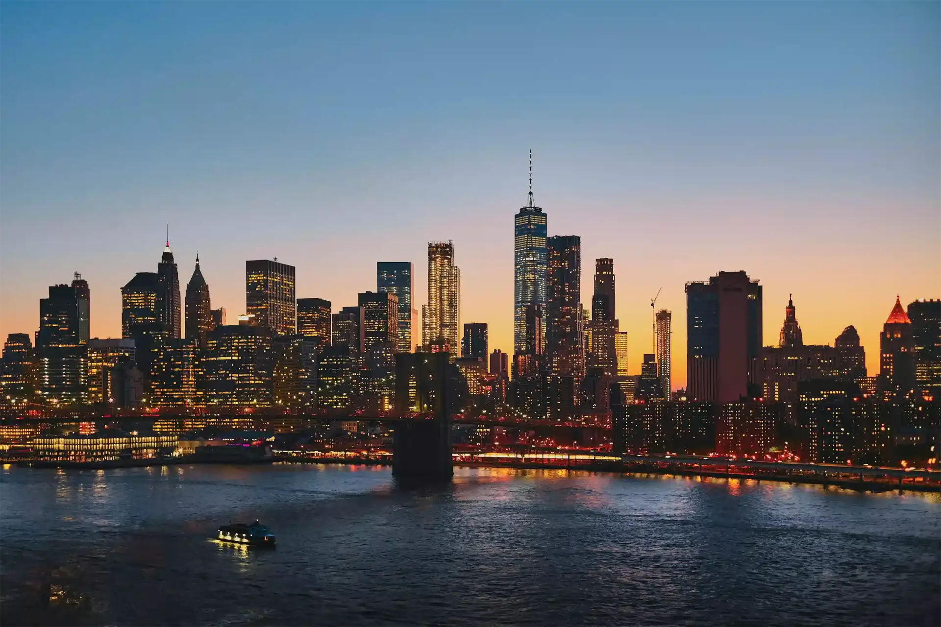 Buildings on a city skyline at dusk